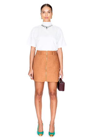 Model styled in the white emerald necklace printed short sleeve top.