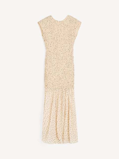 Beige midi dress with black polka dots on a white background