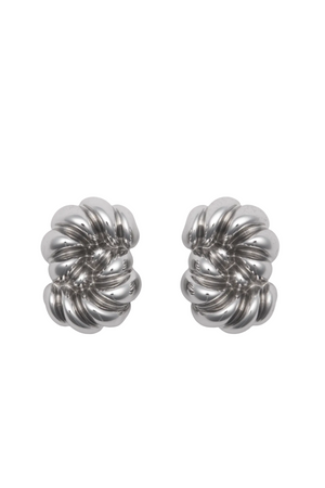 Pair of silver knitted earrings on a white background