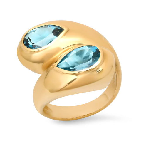 Ghost image of chunky toi-et-moi ring that features two pear-shaped blue topaz stones set in thick bezel settings.