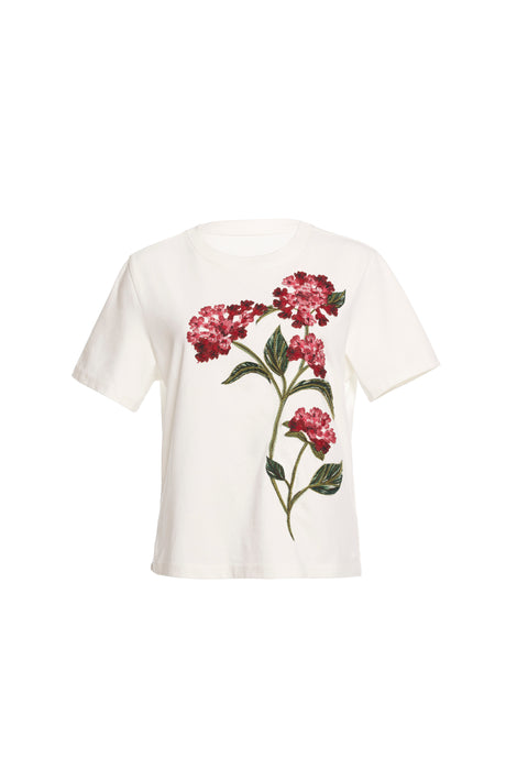Flat lay of white floral t-shirt on a white background