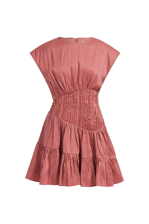 Coral mini dress with tiered skirt on a white background