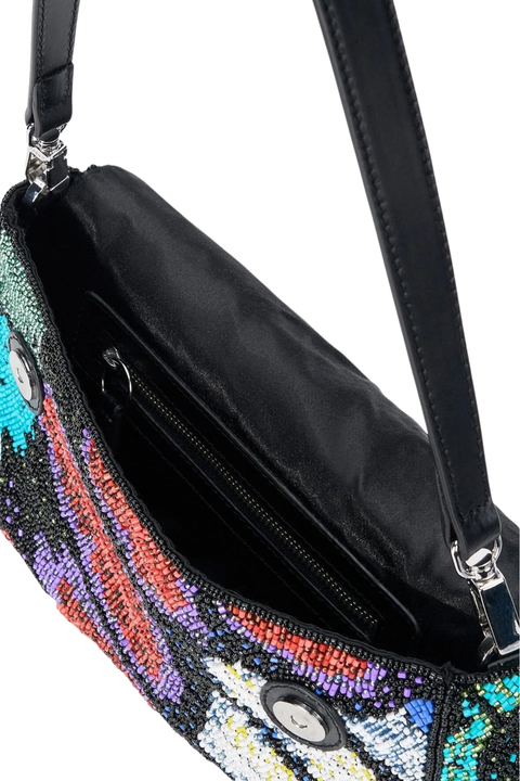 Close-up of a black shoulder bag with a colorful sequined exterior and a black interior lining, shown on a white background.