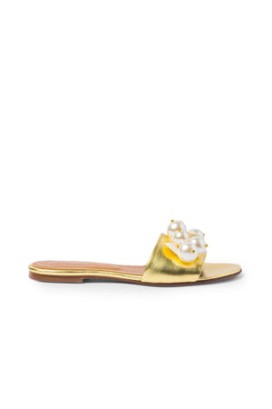Side view of gold slide sandal with pearls.