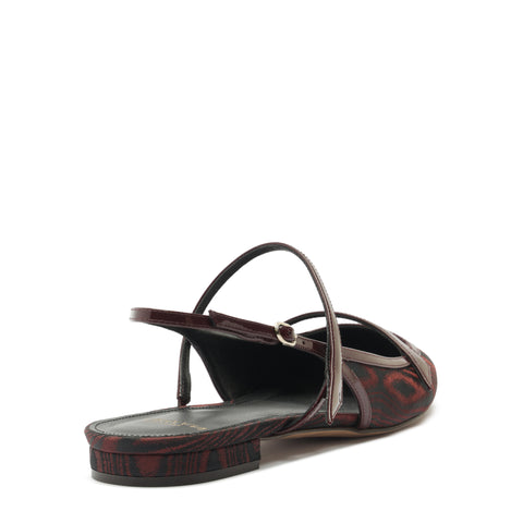 Brown sandal with a strap on a white background