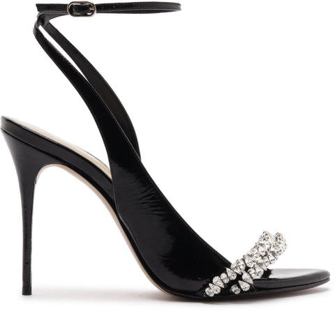 Black high-heeled sandal with a decorative strap on a white background