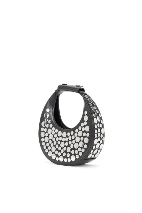 Side angle of a black studded mini handbag.