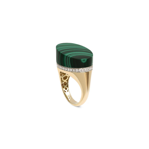 Side view of a gold ring with an asymmetrical malachite stone and diamond accents on a white background
