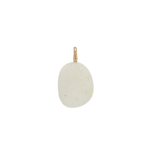 A white stone pendant accented by a curve of small round diamonds with a gold bail.