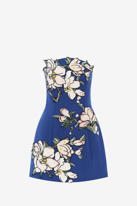 Blue mini dress with white floral pattern on a white background
