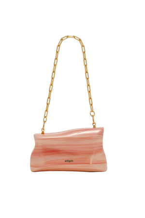 Pink handbag with gold chain strap on a white background