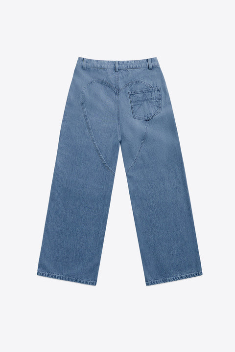 Wide leg blue jeans on a white background