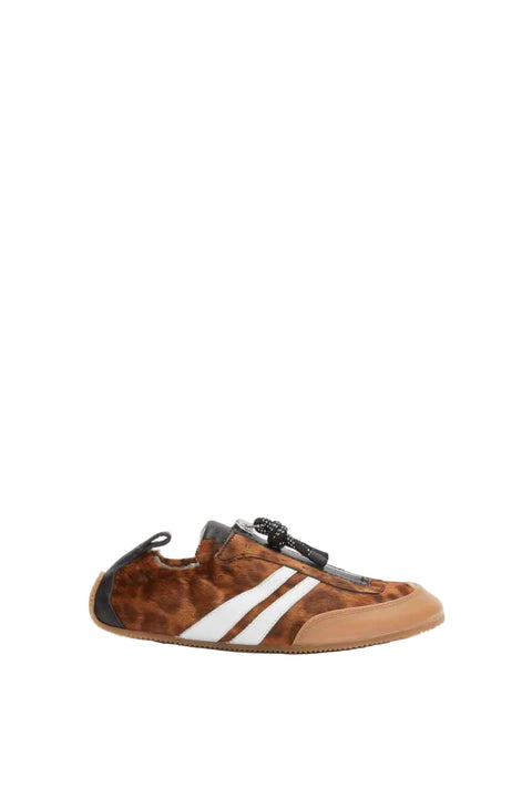 Side view of leopard print sneaker with white stripes on a white background