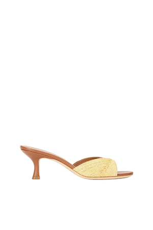 Yellow sandal with a brown heel on a white background