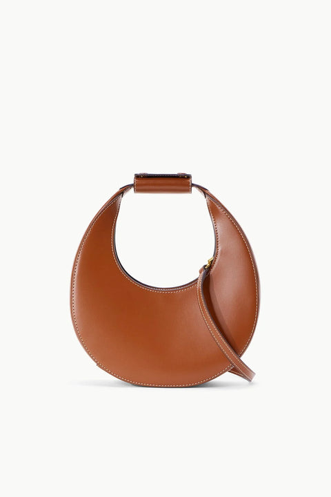 Brown leather small handbag in the shape of a moon with an optional shoulder strap.