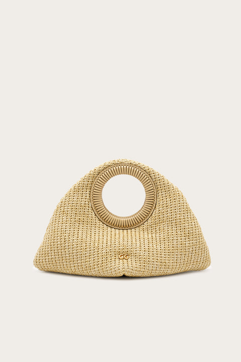Beige woven handbag with circular handles on a beige background