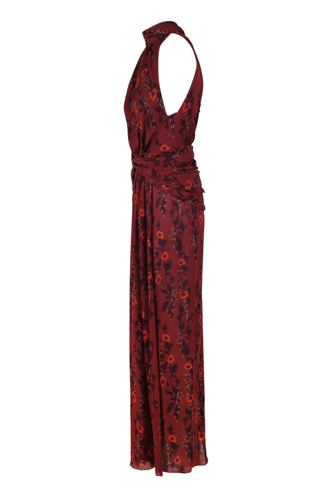 A burgundy-wine maxi dress with a halter neck and ruched waist side angle