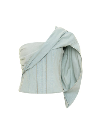 Light blue denim bustier top with drape.