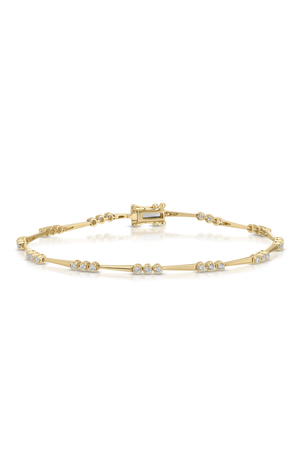 Gold bracelet with small diamonds on a white background