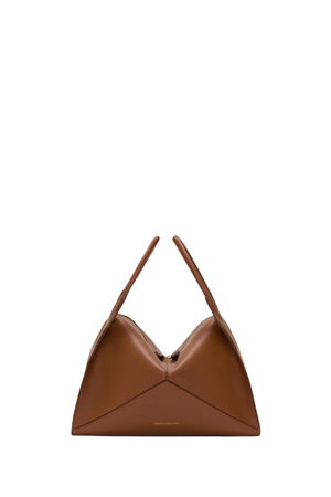 A tan leather handbag with a v-shape and top handles