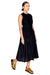 Model walking to the right wearing the black cotton midi dress.