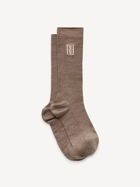 Brown knit long socks with By Malene Birger logo in cream.