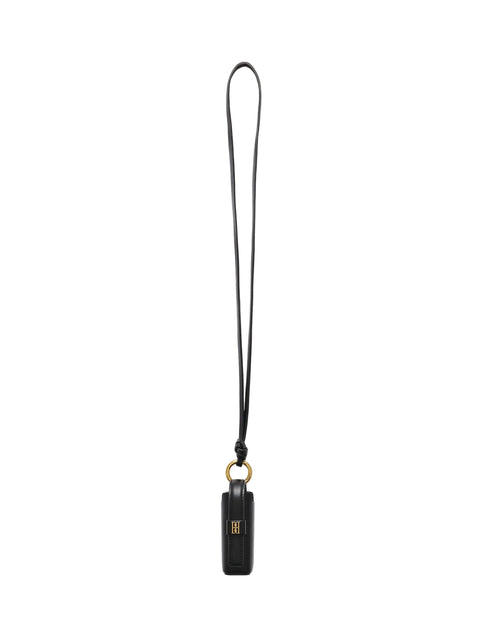 A black leather keychain with a matching black lanyard strap and a gold-tone metal ring, featuring a small gold monogram logo on the key fob, set against a white background.