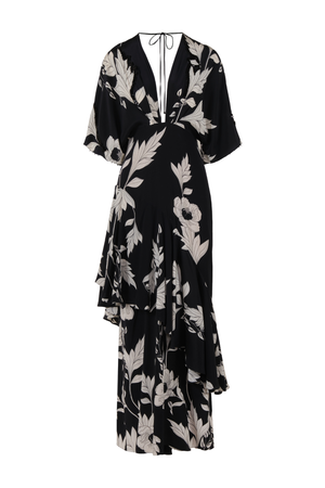 A black midi dress with a beige floral and leaf print, featuring a wrap-style V-neckline with tie details, short sleeves, and an asymmetrical ruffled hem, shown against a plain white background.