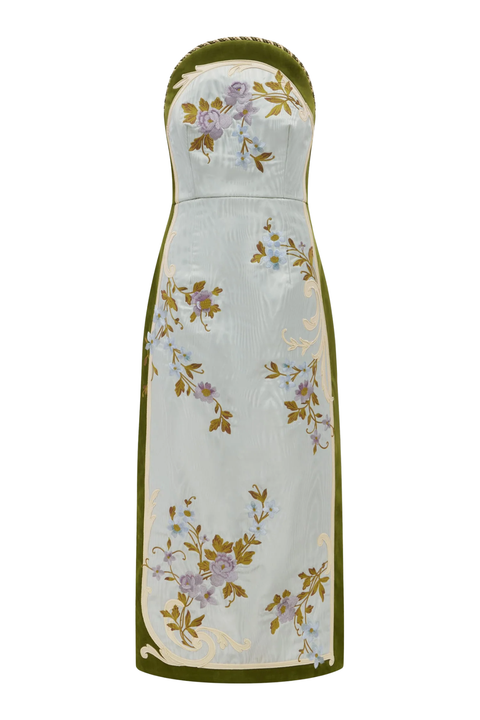 A strapless maxi dress with a fitted bodice and a flowing skirt, featuring a light sage green base with olive green trim and an all-over floral pattern in lavender, gold, and light blue.