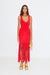 Full body of model wearing the red subtle shimmer tira midi dress with fringe.