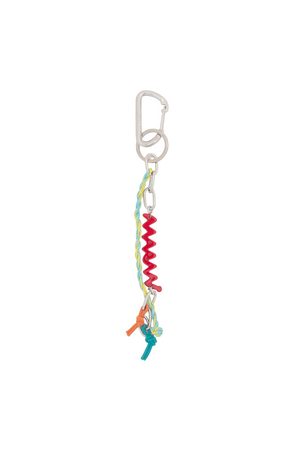 Colorful keychain with a unique design on a beige background