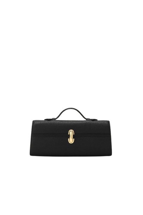 A black, grained calf leather clutch that features a small top handle and gold hardware. 