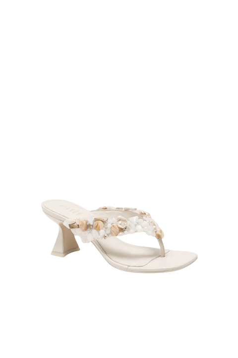 White heeled thong flip flop sandal with beaded embellishments close up