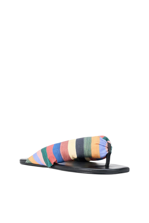 A puffy flip flop with a rainbow striped thong