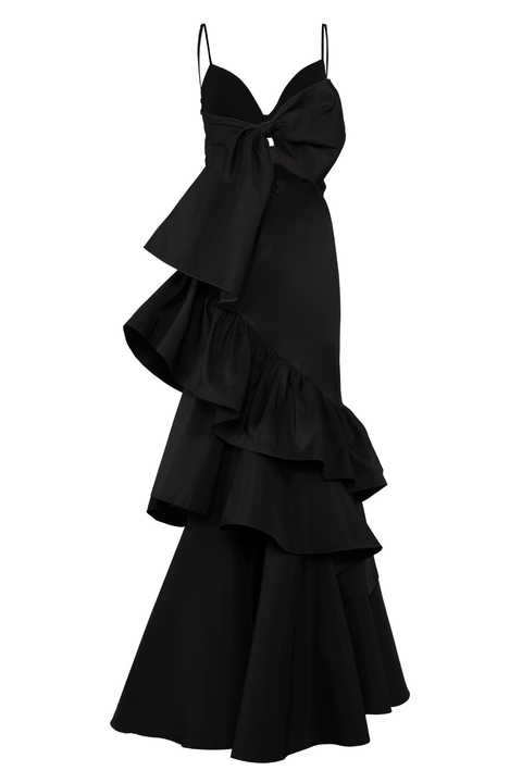 A black spaghetti-strap midi dress with a sweetheart neckline, a large bow detail at the bust, and a dramatic cascading ruffle skirt, shown against a plain white background.