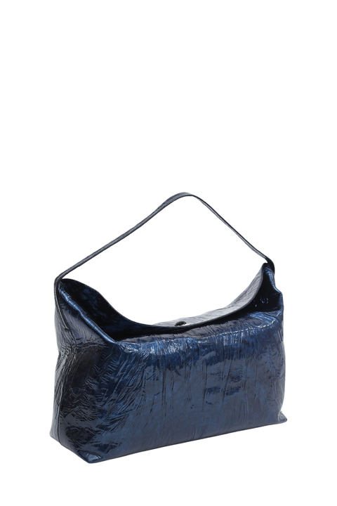 A dark blue crinkled leather shoulder bag with a single strap, photographed on a solid white background.