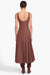 Model facing the back in the brown sleeveless midi dress