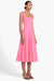 Model turned to the right in the pink sleeveless midi dress 