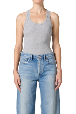 Grey bodysuit and mid-rise light washed denim