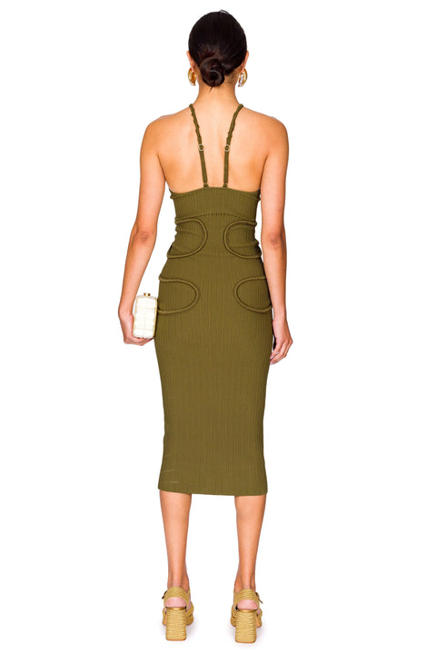 Back view of a woman wearing a green knit midi dress that features a halter neck and crochet rib detailing. 