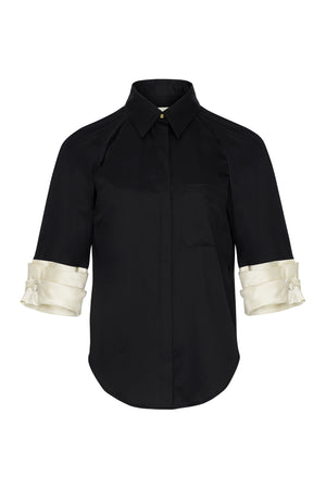 Black satin crepe shirt with contrasting cuffs.
