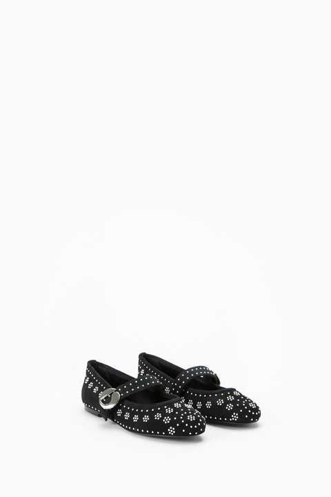 Black ballet flat shoes with silver stud floral patterns on a white background