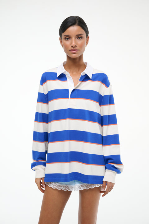 Woman wearing a blue and white striped shirt on a white background