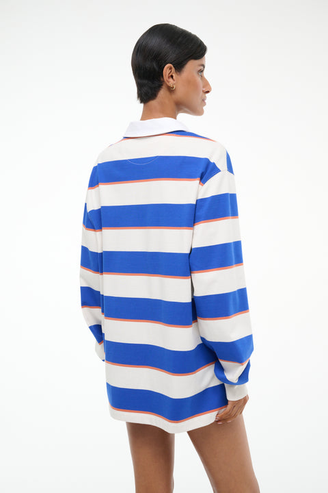 Back-facing person wearing a blue and white striped shirt on a white background