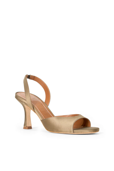 Gold high-heeled sandal on a white background