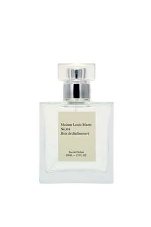 A clear glass perfume bottle with a silver spray cap and a beige label reading Maison Louis Marie No.04 Bois de Balincourt, shown on a plain white background.