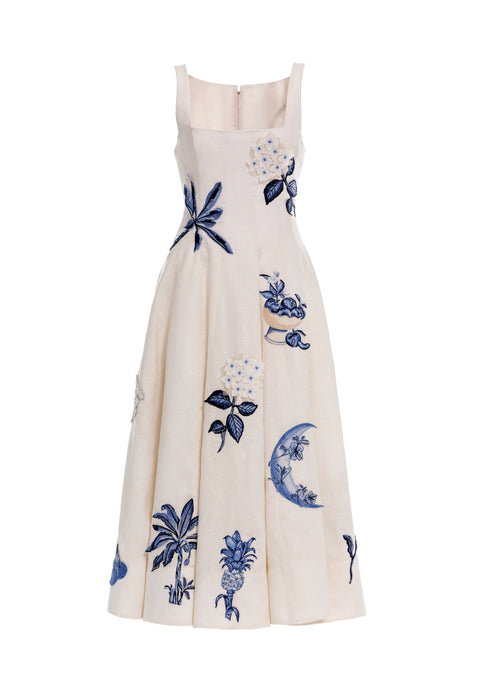 Square neck white linen midi dress with blue embroidered details.