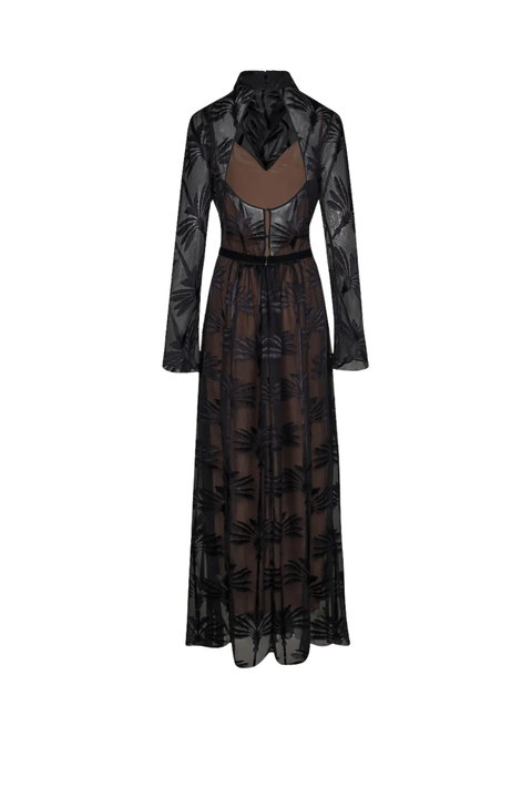 A long-sleeved black sheer mesh maxi dress with a floral pattern, featuring a brown faux-leather bust panel and a matching waist tie, shown against a plain white background.