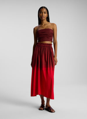Model styled in the red ombre gina skirt.