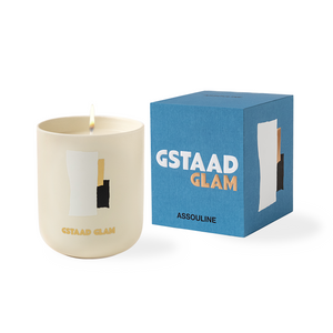 The Gstaad Glam candle next to its blue box